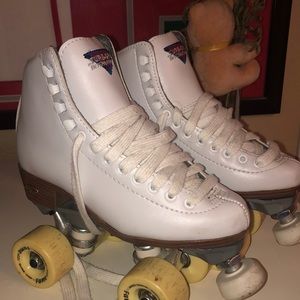 White sure grip international skates